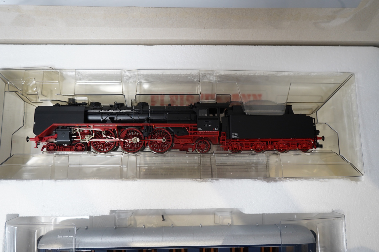 Two boxed Fleischmann HO gauge German passenger train sets, both comprising of a tender locomotive and bogie coaches (4885 and 4894), together with a Liliput 4-6-2 locomotive (4001) and a DR Rhinegold coach set (820), (4